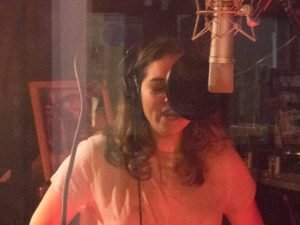 Spanish language version of 'Bad Guys' by Gone Marshall being recorded in Florida, USA